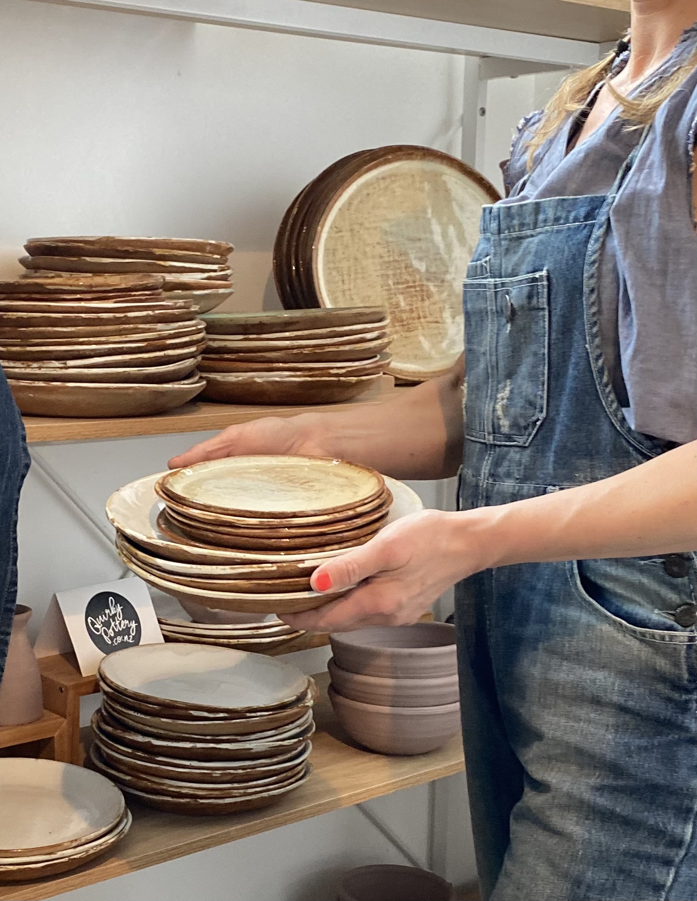 A stack of handmade plates